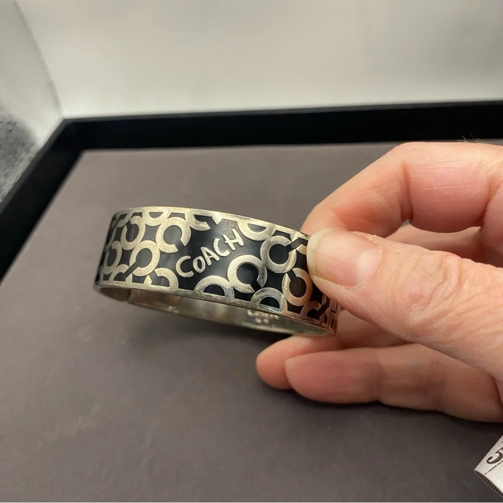 Coach Silver-Tone Black Logo Hinged Bangle Bracelet